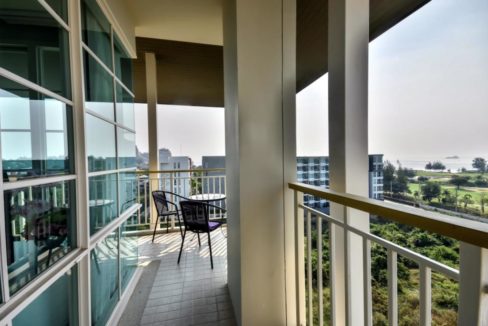 12 Corner balcony with sea and golf view